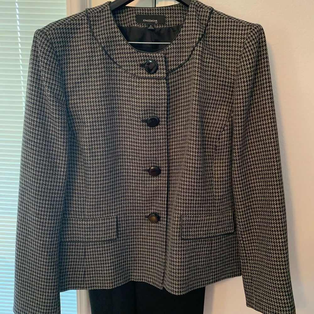 Ladies Houndstooth silk-lined jacket and black sleek skirt
